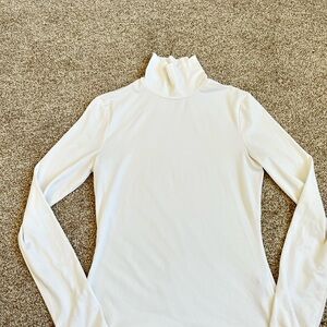 White turtle neck